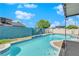 Clear swimming pool featuring desert landscaping and an area to relax in the sun at 2302 Wagonwheel Ave, Las Vegas, NV 89119