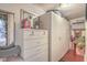 Walk-in closet with white dresser and wardrobe for lots of storage space at 2700 Brienza Way, Las Vegas, NV 89117
