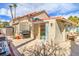 Outdoor patio area with grill, seating, and sliding glass doors leading to the interior at 2700 Brienza Way, Las Vegas, NV 89117