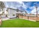 Expansive backyard featuring well-maintained lawn and a covered patio, perfect for outdoor activities and relaxation at 2834 Natalie Ave, Las Vegas, NV 89121