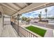 Charming balcony view showcases the well-maintained front yard, enhancing the curb appeal of this delightful home at 2834 Natalie Ave, Las Vegas, NV 89121