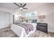 Comfortable bedroom with ceiling fan, neutral decor, and bright natural light at 2834 Natalie Ave, Las Vegas, NV 89121