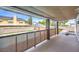 Relaxing covered patio with stylish privacy screening, offering a serene outdoor space for entertainment and relaxation at 2834 Natalie Ave, Las Vegas, NV 89121