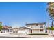 Two-story home featuring a covered balcony and carport, offering convenient parking and stylish outdoor living spaces at 2834 Natalie Ave, Las Vegas, NV 89121