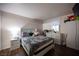 Bright bedroom with laminate floors, lots of light and an organized dresser at 2969 Juniper Hills Blvd # 103, Las Vegas, NV 89142