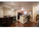 Dining area with hardwood floors and kitchen breakfast bar at 2969 Juniper Hills Blvd # 103, Las Vegas, NV 89142