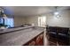 Kitchen with granite countertops extending to dining area at 2969 Juniper Hills Blvd # 103, Las Vegas, NV 89142