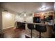 Open concept kitchen features breakfast bar and overlooks dining area at 2969 Juniper Hills Blvd # 103, Las Vegas, NV 89142