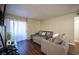 Cozy living room with modern decor and sliding door access to the outside at 2969 Juniper Hills Blvd # 103, Las Vegas, NV 89142