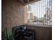 Small outdoor patio features a grill and a view of the complex at 2969 Juniper Hills Blvd # 103, Las Vegas, NV 89142