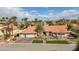 Expansive single-story home with a two-car garage, desert landscaping, and a red tile roof at 3236 Cliff Sieler Ct, Las Vegas, NV 89117