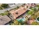 An aerial perspective of a backyard oasis featuring a pool, spa, patio, and manicured landscaping at 3236 Cliff Sieler Ct, Las Vegas, NV 89117