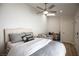 Cozy bedroom with modern ceiling fan and neutral decor at 3236 Cliff Sieler Ct, Las Vegas, NV 89117