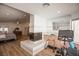 Bedroom with fireplace, exercise bike, and view to a secondary room at 3236 Cliff Sieler Ct, Las Vegas, NV 89117