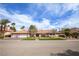 Charming single-story home with a well-manicured front yard and a two-car garage at 3236 Cliff Sieler Ct, Las Vegas, NV 89117