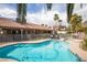 Gorgeous pool, tropical palms, spa, and backyard, perfect for outdoor relaxation and enjoyment at 3236 Cliff Sieler Ct, Las Vegas, NV 89117