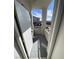 The open door leads to a balcony overlooking the street at 3318 N Decatur Blvd # 1056, Las Vegas, NV 89130