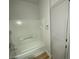 Bathroom showcases a tub-shower combo and an adjacent linen closet at 3318 N Decatur Blvd # 1056, Las Vegas, NV 89130