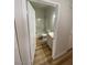 Bright bathroom featuring tub, toilet, and vanity with tile counter at 3318 N Decatur Blvd # 1056, Las Vegas, NV 89130