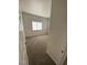 The entryway of a bedroom with carpet and a window for natural light at 3318 N Decatur Blvd # 1056, Las Vegas, NV 89130