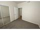 Neutral bedroom with carpet, window, and closet with sliding doors at 3318 N Decatur Blvd # 1056, Las Vegas, NV 89130
