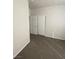 This is an empty bedroom with carpet at 3318 N Decatur Blvd # 1056, Las Vegas, NV 89130