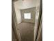 Bright bedroom featuring neutral carpet, window, and light walls at 3318 N Decatur Blvd # 1056, Las Vegas, NV 89130