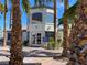Attractive building entrance with palm trees, signage, and a manicured landscape at 3318 N Decatur Blvd # 1056, Las Vegas, NV 89130