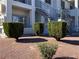 Exterior shot with attractive, manicured landscaping near building access stairs at 3318 N Decatur Blvd # 1056, Las Vegas, NV 89130