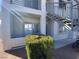 Attractive exterior of unit with stairway access; bike parked nearby at 3318 N Decatur Blvd # 1056, Las Vegas, NV 89130