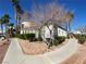 Charming townhome exterior with desert landscaping at 3318 N Decatur Blvd # 1056, Las Vegas, NV 89130