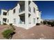 Exterior elevation showcasing patios, windows, and landscaping at 3318 N Decatur Blvd # 1056, Las Vegas, NV 89130