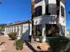 Charming building exterior, showcasing large windows and stucco walls, nestled in a well-maintained landscape at 3318 N Decatur Blvd # 1056, Las Vegas, NV 89130