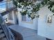 Sidewalk leads to unit entrance with stairs and exterior window at 3318 N Decatur Blvd # 1056, Las Vegas, NV 89130
