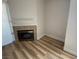 The living room showcases a cozy fireplace and adjacent sliding door access at 3318 N Decatur Blvd # 1056, Las Vegas, NV 89130