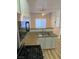 Kitchen sink and gas range with view of adjacent room at 3318 N Decatur Blvd # 1056, Las Vegas, NV 89130