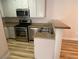 This kitchen features stainless steel appliances and neutral countertops at 3318 N Decatur Blvd # 1056, Las Vegas, NV 89130
