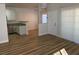Bright living area showcases open floor plan and modern stainless steel appliances at 3318 N Decatur Blvd # 1056, Las Vegas, NV 89130