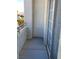 Balcony with sliding glass door and railings at 3318 N Decatur Blvd # 1056, Las Vegas, NV 89130