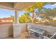 Cozy balcony with a table and chairs, perfect for outdoor relaxation and enjoying the surrounding views at 354 Sunward Dr # 354, Henderson, NV 89014