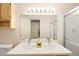 Bathroom features a double sink vanity, a shower with a glass door, and modern lighting at 354 Sunward Dr # 0, Henderson, NV 89014