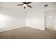 Spacious bedroom with ceiling fan, neutral walls, and carpet flooring at 354 Sunward Dr # 0, Henderson, NV 89014