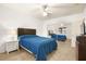 Comfortable bedroom with a queen bed, mirrored closet, and ceiling fan at 354 Sunward Dr # 0, Henderson, NV 89014
