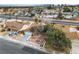 Aerial view of the house with mature trees and desert rock landscaping at 3572 Tempe St, Las Vegas, NV 89103