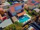 Aerial shot of home showcasing backyard pool, spa, patio, and solar panels at 37 Stone Cress Dr, Henderson, NV 89074