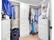 Walk-in closet featuring built-in shelves, drawers and ample storage space for clothing at 37 Stone Cress Dr, Henderson, NV 89074