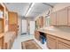A clean garage with organized storage and a neutral color scheme at 37 Stone Cress Dr, Henderson, NV 89074