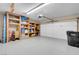 Spacious garage with built-in shelving for storage and organization at 37 Stone Cress Dr, Henderson, NV 89074
