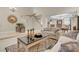 Bright living room with neutral tones, elegant furniture, tile flooring, and an inviting open layout at 37 Stone Cress Dr, Henderson, NV 89074