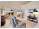 Open-concept living space with dining area, showcasing natural light and a view into the kitchen at 37 Stone Cress Dr, Henderson, NV 89074
